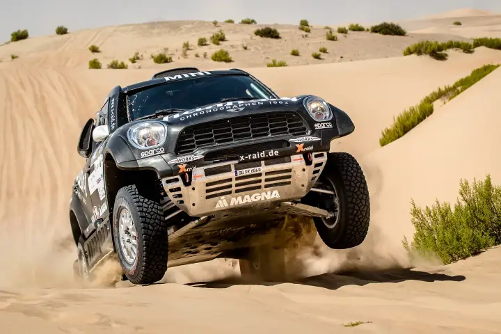 Abu Dhabi Desert Challenge 2018: Mini front view launching over sandy crest