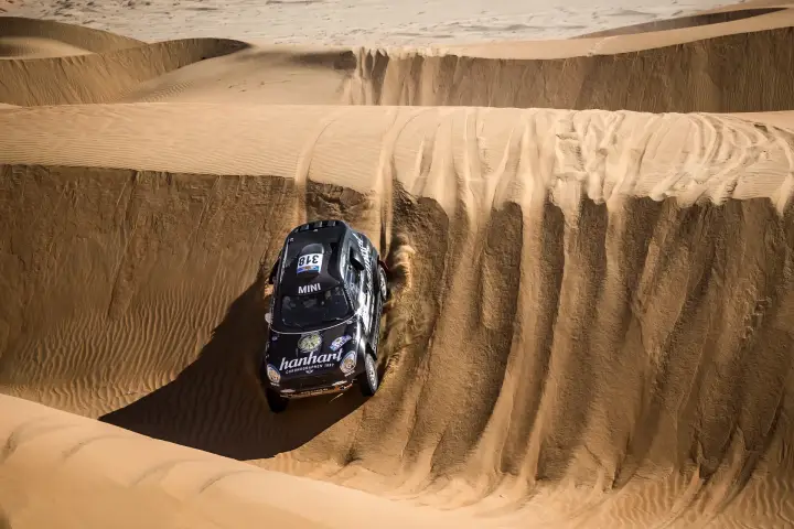 Abu Dhabi Desert Challenge 2018: aerial view Mini descending steep desert dune