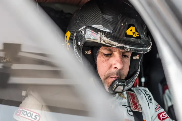 Baja Aragón 2016: driver in helmet concentrated inside race car