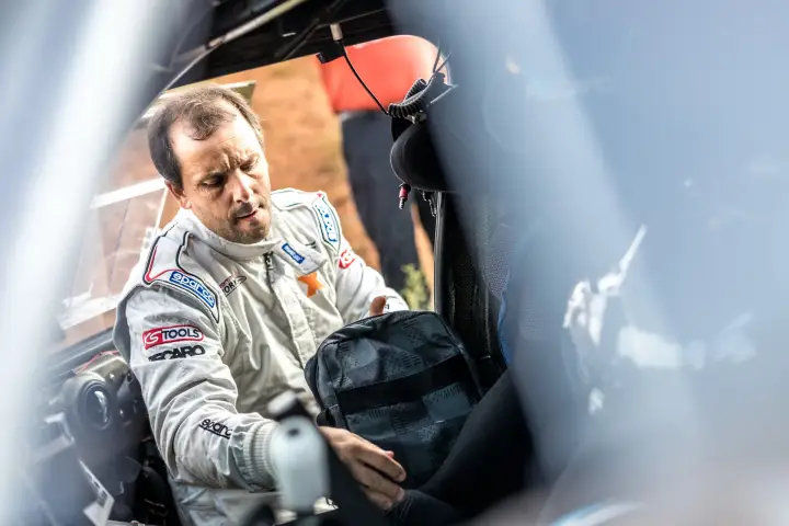 Baja Aragón 2017: driver checking equipment inside car before stage