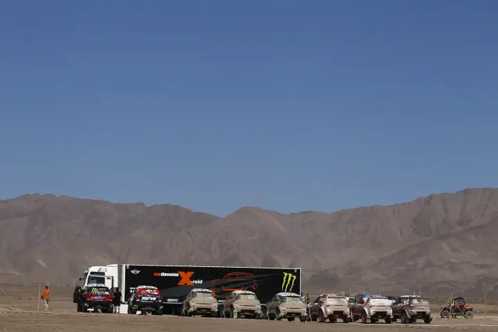 Dakar Rally 2012: X-raid team truck and cars lined up at bivouac