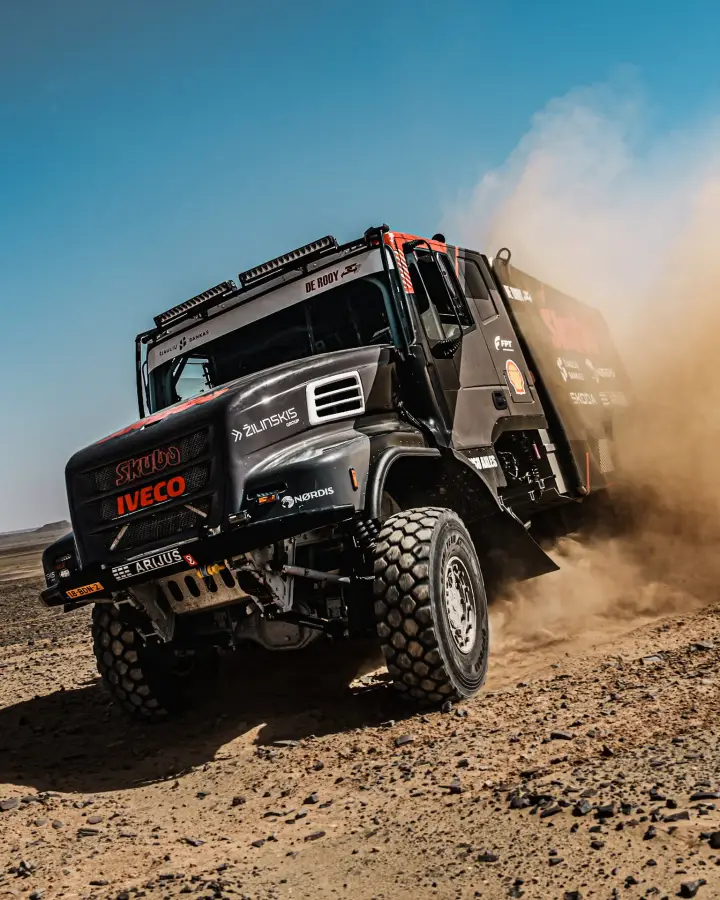 Dakar Rally 2025: Skuba Iveco truck front three-quarter rocky desert turn