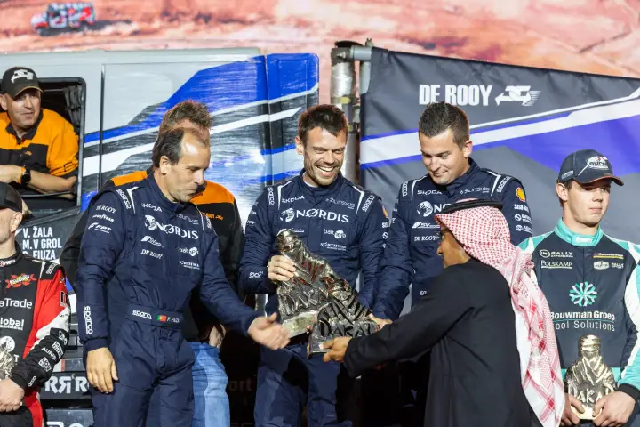 Dakar Rally 2026: NORDIS crew presenting Dakar trophy on stage