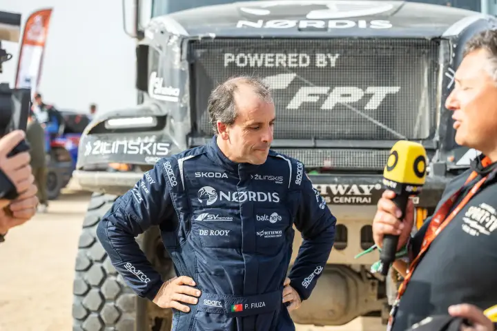 Dakar Rally 2026: Paulo Fiuza giving interview beside NORDIS truck