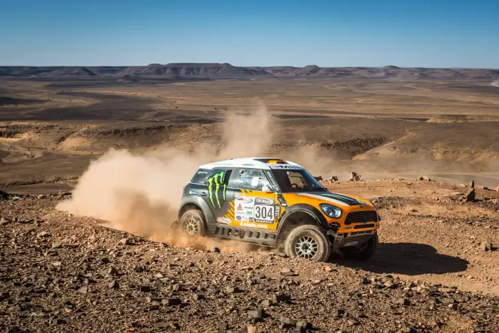 Rallye du Maroc 2013: orange Mini racing across Moroccan rocky plateau