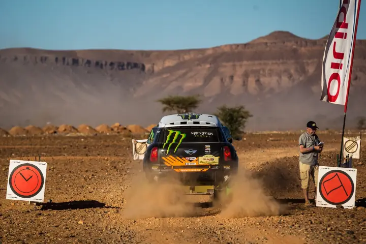 Rallye du Maroc 2013: rear view Mini at time control checkpoint Morocco
